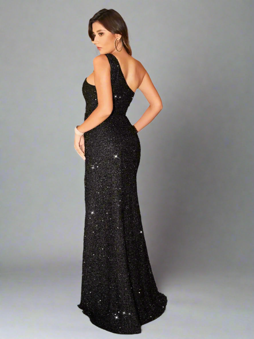 Rear view of the black sequin one-shoulder maxi dress, showcasing the elegant back design and full skirt.