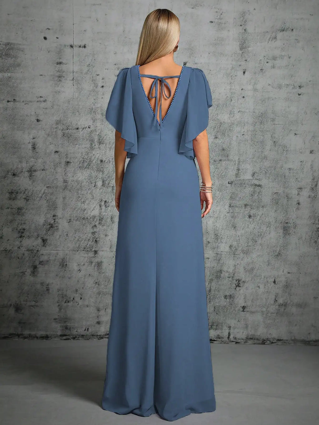 blue evening gown with soft flutter sleeves and fitted waist
