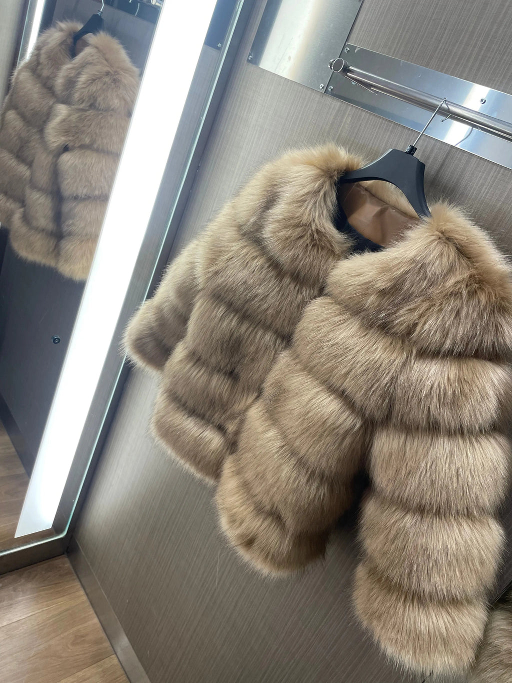 Luxury fashion look with faux fur coat