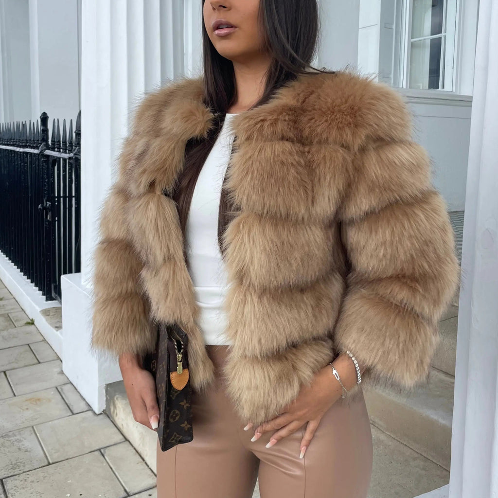 Model wearing faux fur coat