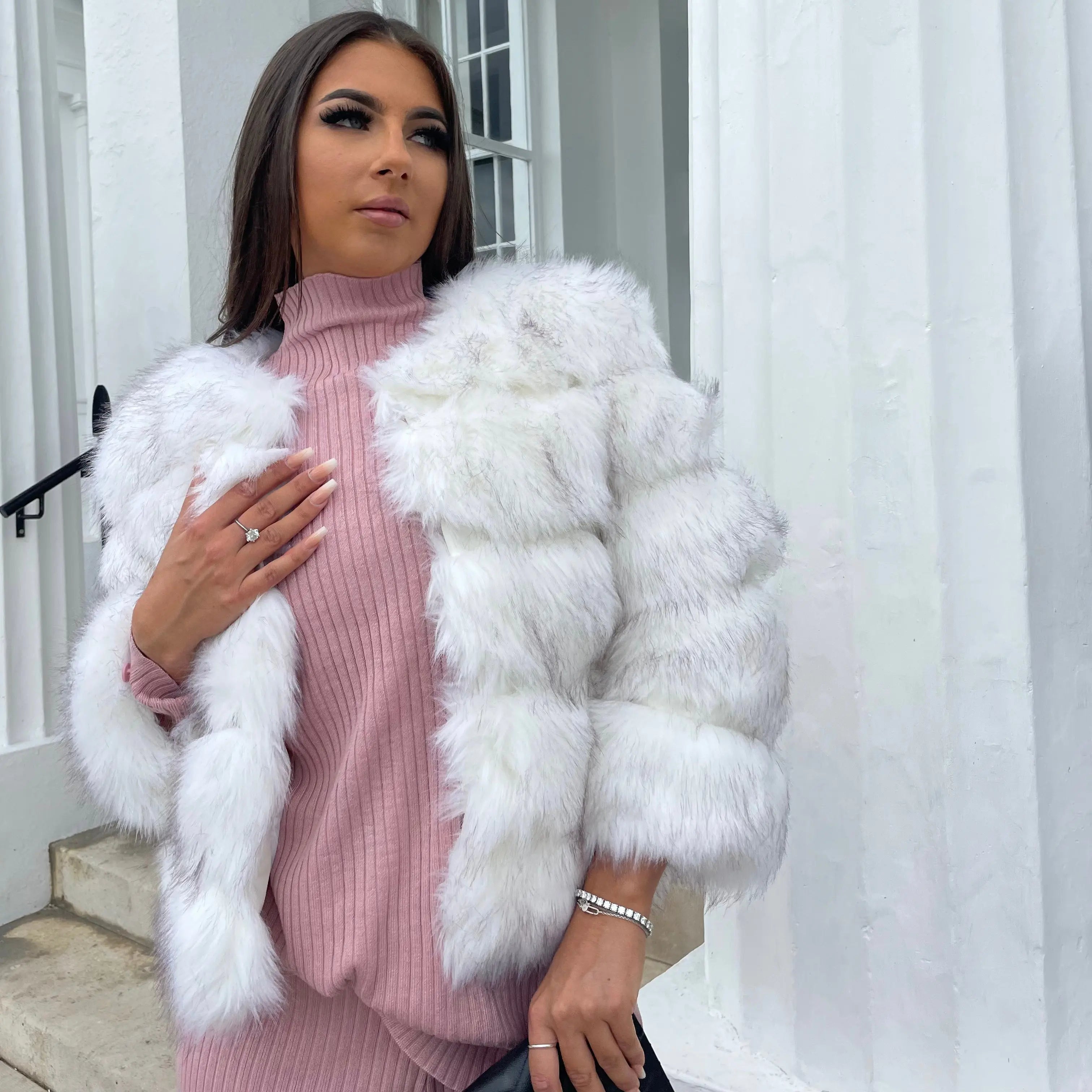 Faux fur coat styled for party wear