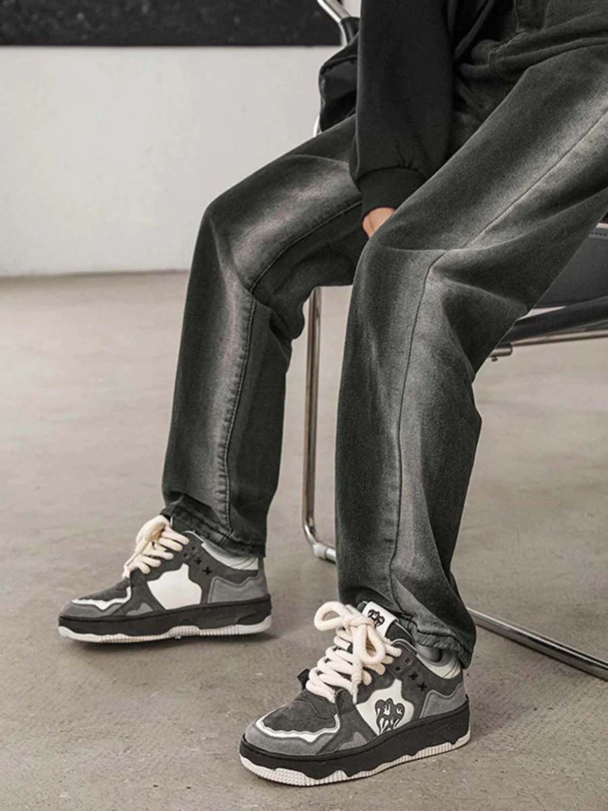Angled view of men’s grey suede chunky sneakers