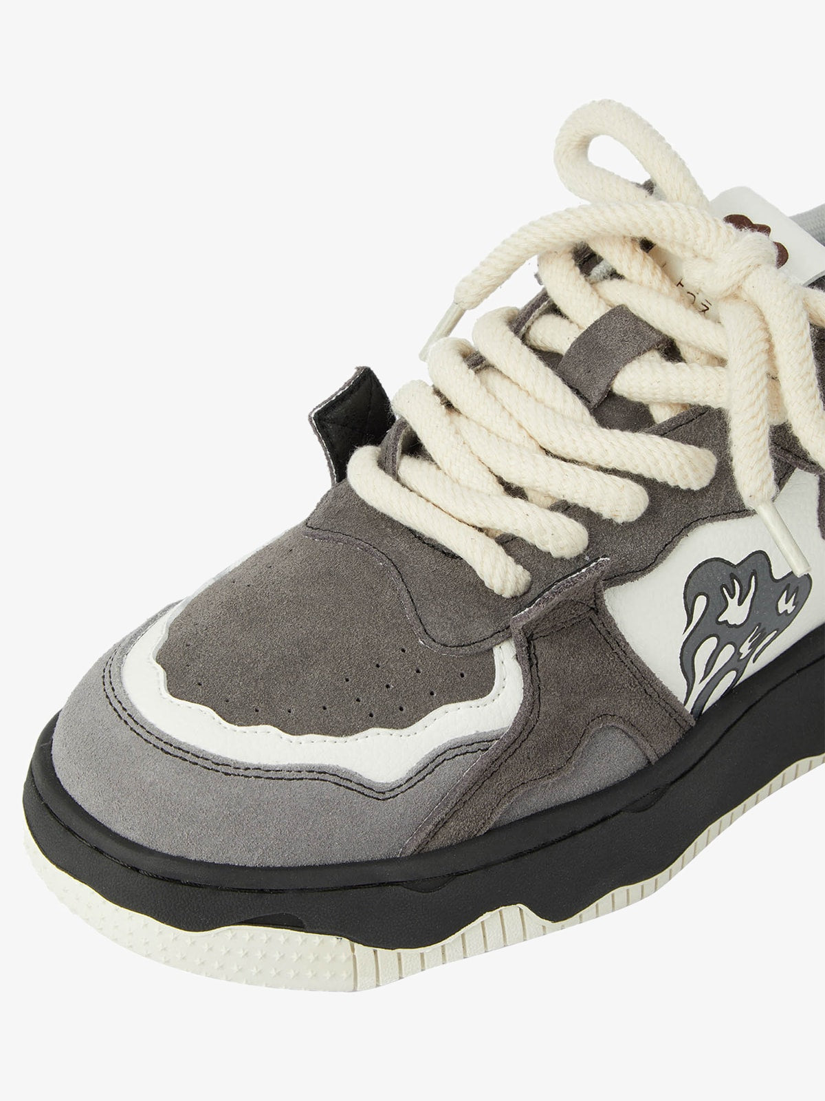 Close-up of men’s grey suede chunky sneakers material