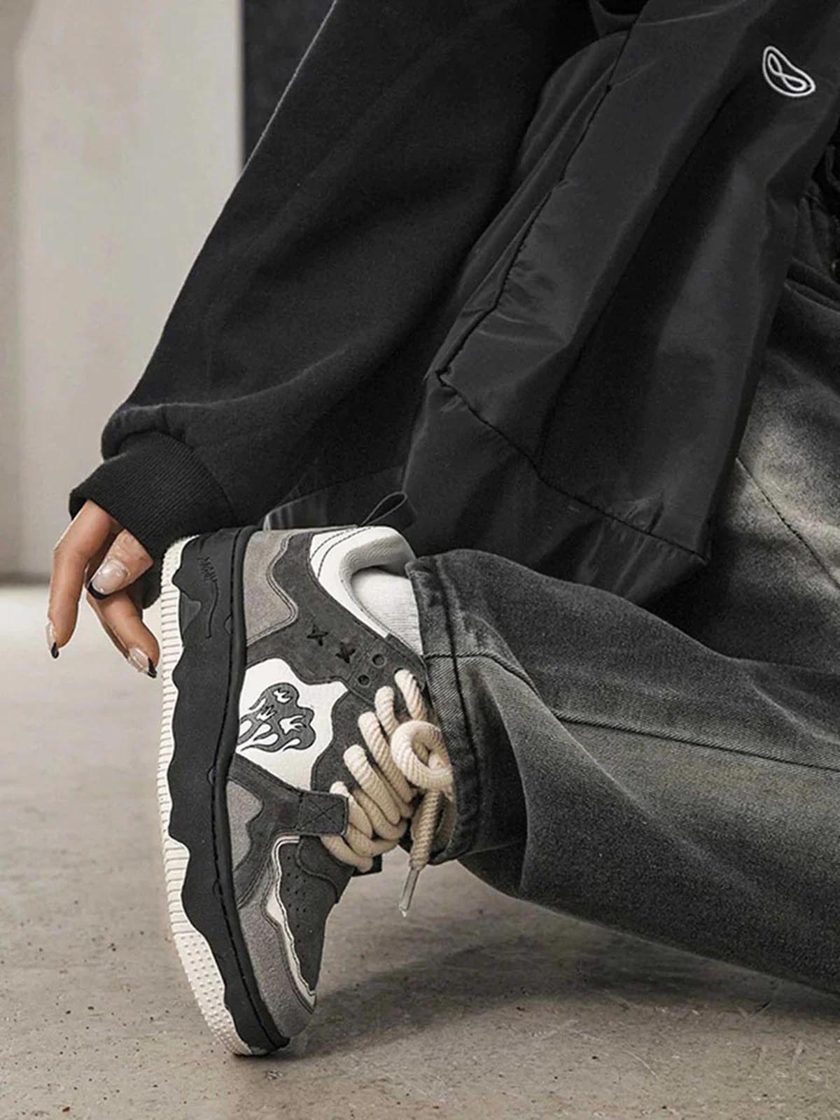Fashion shot of men’s grey suede chunky sneakers