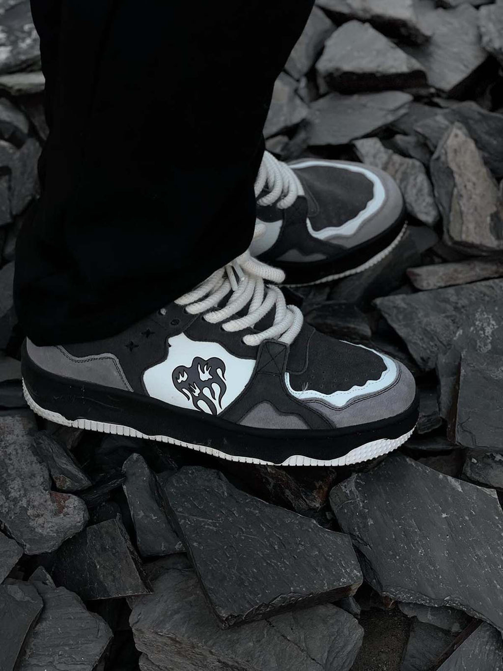 Outdoor shot of men’s grey suede chunky sneakers