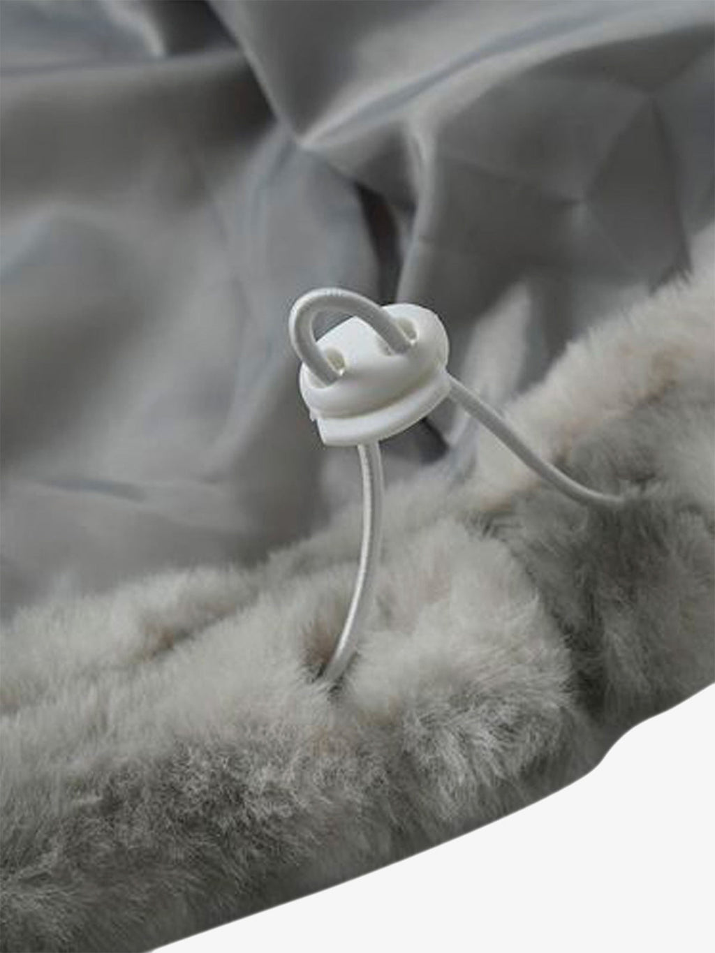 Fashion shot of men’s grey tie-dye faux fur jacket