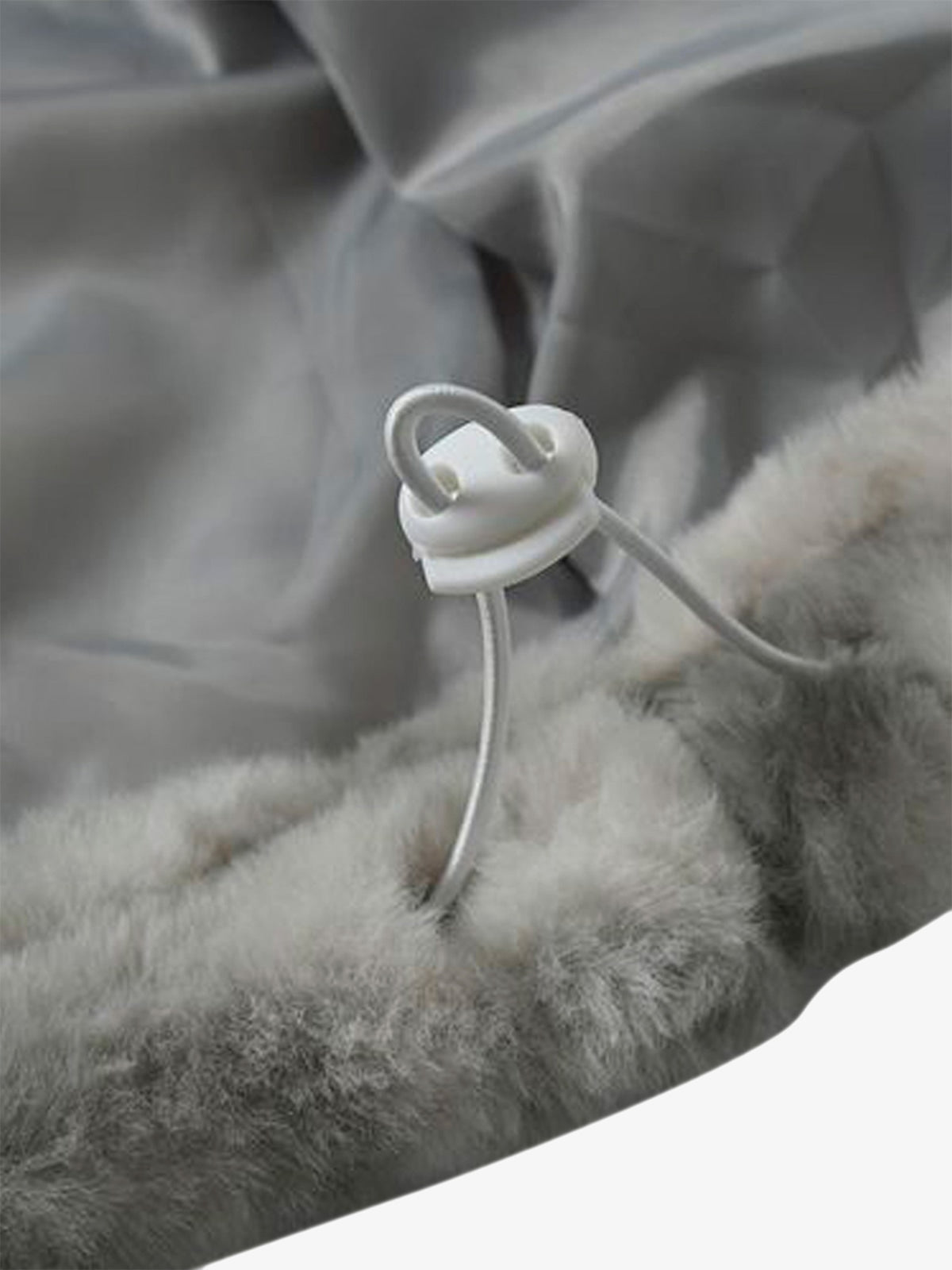 Fashion shot of men’s grey tie-dye faux fur jacket