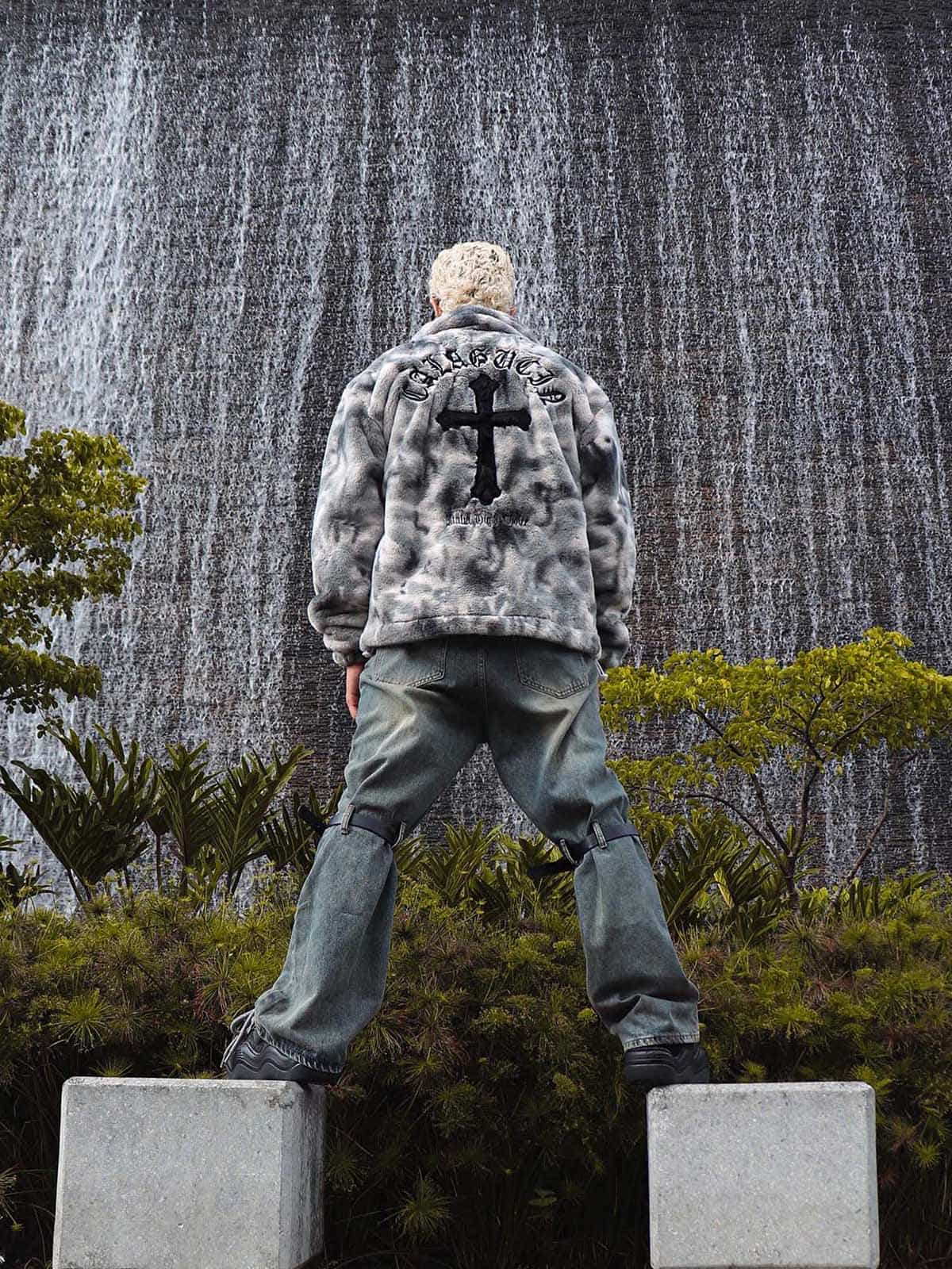 Close-up of zipper on men’s faux fur tie-dye jacket