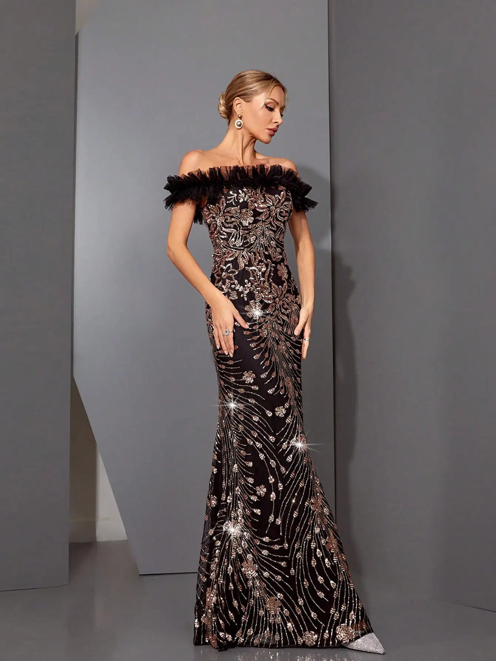 Flat lay of black sequin fishtail dress for formal occasions

