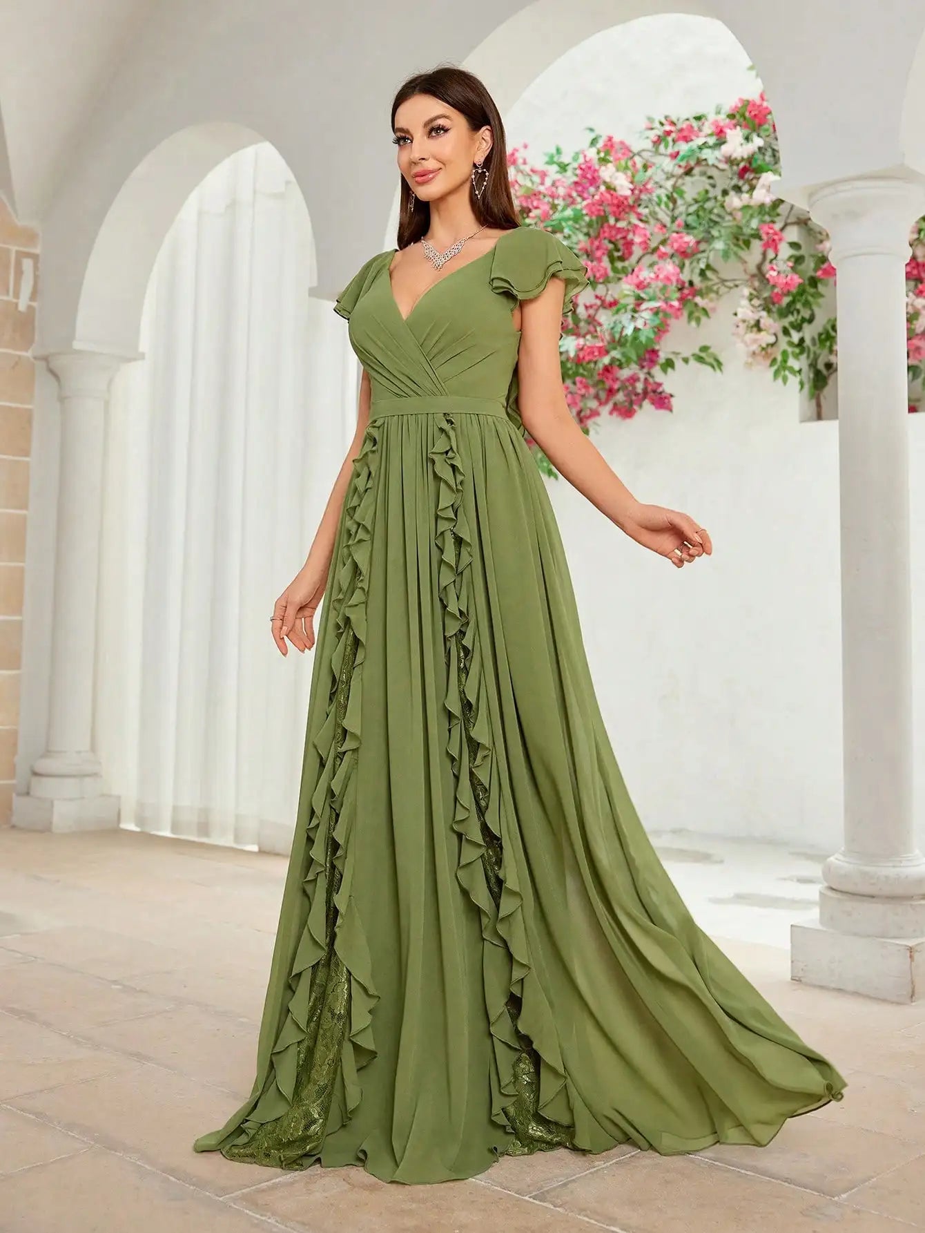 Close-up of flutter sleeves and pleated bodice of chiffon formal dress
